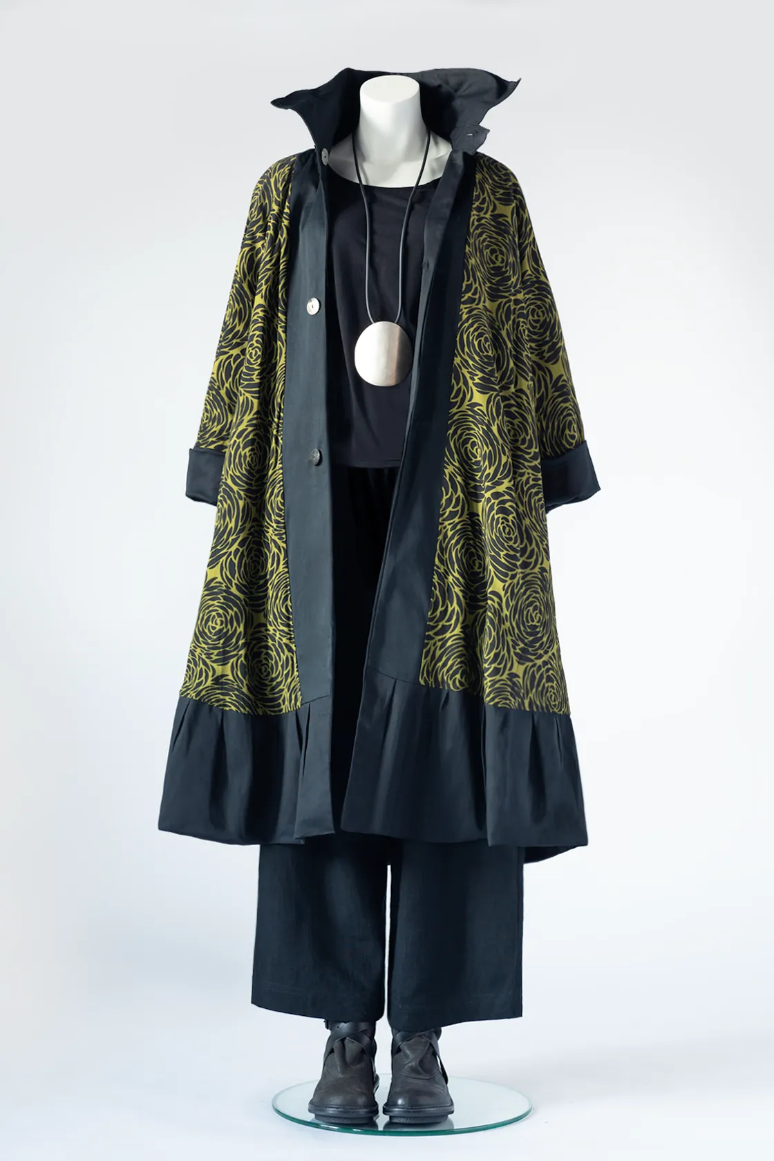 The Hepburn Coat in Black Smooth w/ Green Storm